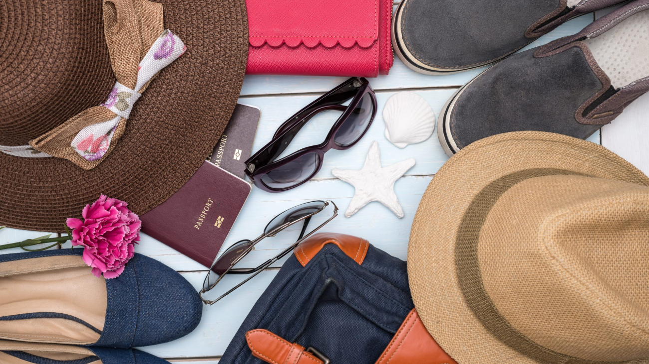Overhead view of traveler accessories, Essential vacation items, Travel concept background