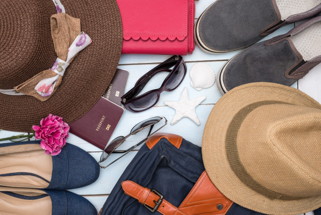 Overhead view of traveler accessories, Essential vacation items, Travel concept background
